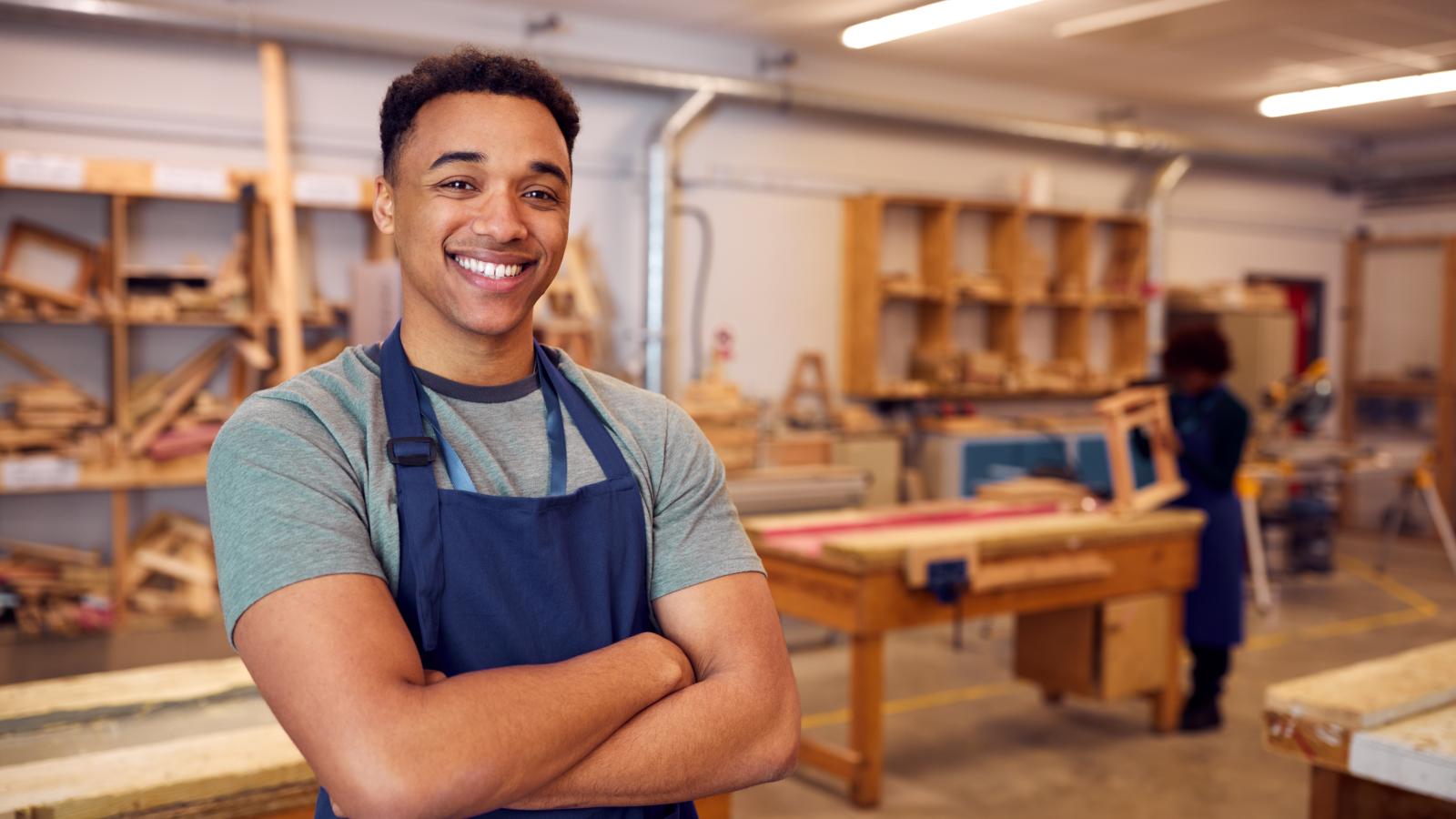 Portrait of young man in workshop